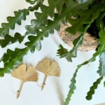 Gouden wandhaken bladeren planten